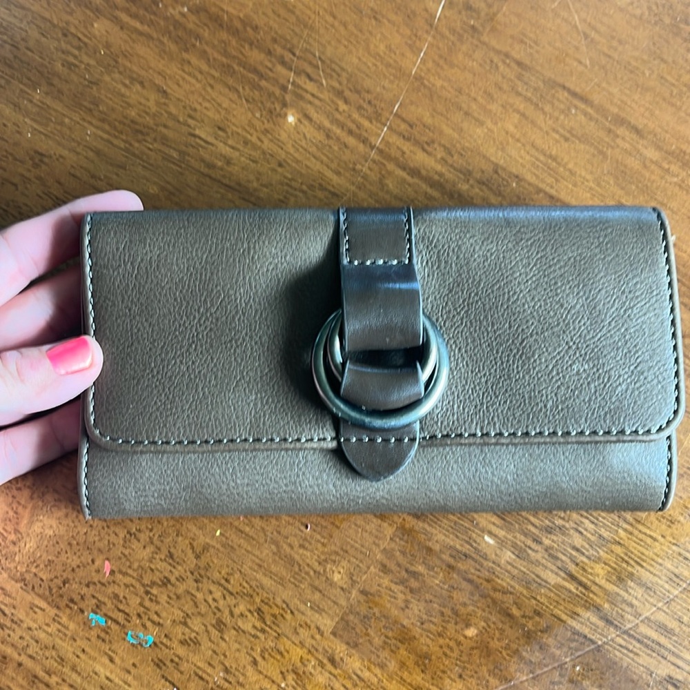 Frye and co leather wallet in excellent used condition. Brown in color.